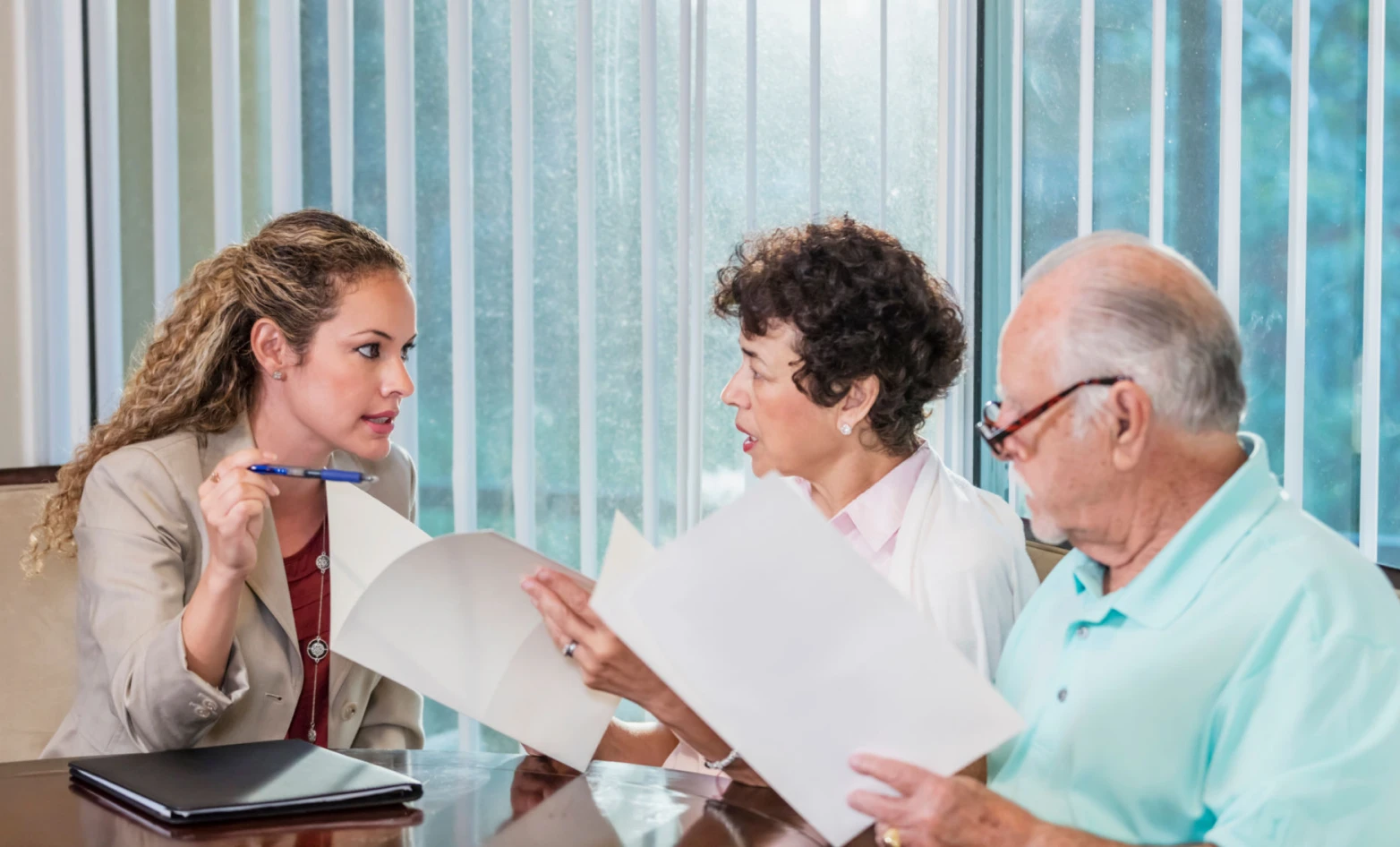 Group reviewing paperwork together